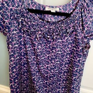 Super flattering Banana top. Light weight